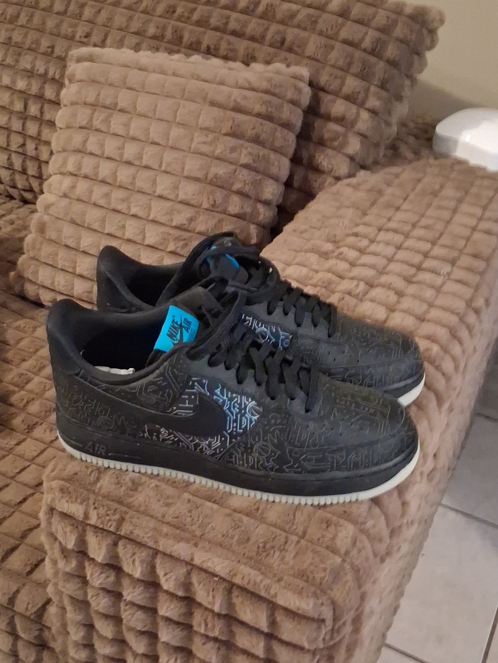 Nike Men's Black Sneakers with Blue Tongue Accent
